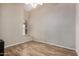 Bedroom with tile floors, ceiling fan, and window at 21964 N 59Th Ln, Glendale, AZ 85310