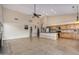 Kitchen with wood cabinets, granite counters and island at 21964 N 59Th Ln, Glendale, AZ 85310