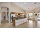 Bright kitchen featuring an island, stainless steel appliances, and wood cabinets at 21964 N 59Th Ln, Glendale, AZ 85310