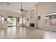 Living room with fireplace, high ceilings and access to backyard at 21964 N 59Th Ln, Glendale, AZ 85310