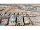 Aerial view of a two story house in a suburban neighborhood at 23059 E Pummelos Rd, Queen Creek, AZ 85142