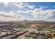 Aerial view of community with lake and mountains at 23059 E Pummelos Rd, Queen Creek, AZ 85142