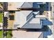 Top-down view of a two-story house with tile roof in a neighborhood at 23059 E Pummelos Rd, Queen Creek, AZ 85142