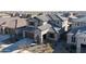 Two story house with gray exterior and tile roof in a neighborhood at 23059 E Pummelos Rd, Queen Creek, AZ 85142