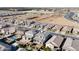 Aerial view of a two story house in a suburban neighborhood at 23059 E Pummelos Rd, Queen Creek, AZ 85142