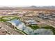 Aerial view of community pool and lake at 23059 E Pummelos Rd, Queen Creek, AZ 85142