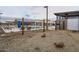 Pathway and gate leading to the community pool at 23059 E Pummelos Rd, Queen Creek, AZ 85142