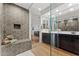 Walk-in shower with hexagon tile and built-in bench at 23059 E Pummelos Rd, Queen Creek, AZ 85142