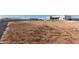 Large desert lot with a view of the house and surrounding area at 24421 W Morning Vista Ln, Wittmann, AZ 85361