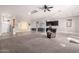 Spacious living room with open floor plan and neutral colors at 24421 W Morning Vista Ln, Wittmann, AZ 85361