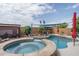 Inviting pool and spa with patio furniture at 26133 W Yukon Dr, Buckeye, AZ 85396