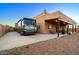 Large backyard with covered patio and RV parking at 270 E 13Th Ave, Apache Junction, AZ 85119