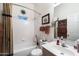 Clean bathroom with shower/tub combo and updated vanity at 270 E 13Th Ave, Apache Junction, AZ 85119