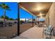 Covered patio with seating area and desert landscaping at 270 E 13Th Ave, Apache Junction, AZ 85119