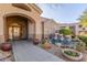 Inviting community entrance with water feature and landscaping at 29606 N Tatum Blvd # 161, Cave Creek, AZ 85331