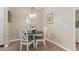 Small dining area with a round table and four chairs at 29606 N Tatum Blvd # 161, Cave Creek, AZ 85331