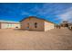 Large backyard with plenty of space for outdoor activities at 32014 N Redding St, Wittmann, AZ 85361