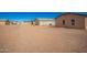 Large backyard with plenty of space for outdoor activities at 32014 N Redding St, Wittmann, AZ 85361