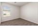 Well-lit bedroom with neutral wall and carpet at 32014 N Redding St, Wittmann, AZ 85361