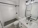 Modern bathroom with white subway tile, quartz vanity, and a walk-in shower at 3334 S Elm St, Tempe, AZ 85282