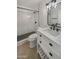 Updated bathroom with white vanity, subway tile, and modern fixtures at 3334 S Elm St, Tempe, AZ 85282