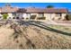 Front view of charming condo with brown tile roof and landscaped lawn at 3334 S Elm St, Tempe, AZ 85282