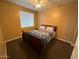 Spacious bedroom with a double bed and ceiling fan at 3469 E Cabazon Ct, Gilbert, AZ 85297