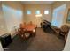 Formal dining room with wood table and piano at 3469 E Cabazon Ct, Gilbert, AZ 85297