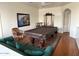 Game room features a pool table, seating, and hardwood floors at 3469 E Cabazon Ct, Gilbert, AZ 85297