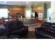 Open kitchen with large island and views into living area at 3469 E Cabazon Ct, Gilbert, AZ 85297