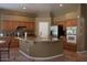 Spacious kitchen with granite island and stainless steel appliances at 3469 E Cabazon Ct, Gilbert, AZ 85297