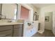 Bathroom with double vanity and a soaking tub at 3948 E Morelos St, Gilbert, AZ 85295