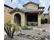 Two-story home with front porch and desert landscaping at 3948 E Morelos St, Gilbert, AZ 85295