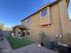 Tan two-story home with a private backyard and covered patio at 3948 E Morelos St, Gilbert, AZ 85295