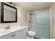 Cozy bathroom featuring a shower and decorative fixtures at 4201 E Camelback Rd # 25, Phoenix, AZ 85018