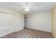 A simple bedroom with carpeted flooring and a large closet at 4201 E Camelback Rd # 25, Phoenix, AZ 85018