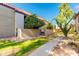 Exterior view of the condo, showcasing its well-maintained landscaping at 4201 E Camelback Rd # 25, Phoenix, AZ 85018