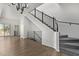 Open living area with wood floors and modern staircase at 421 W 6Th St # 1009, Tempe, AZ 85281