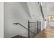 Modern staircase with metal railing and wood flooring at 421 W 6Th St # 1009, Tempe, AZ 85281