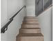 Modern staircase with dark wood treads and metal railing at 421 W 6Th St # 1009, Tempe, AZ 85281