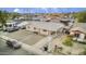 Single story house with driveway and street view at 4216 N 72Nd Ln, Phoenix, AZ 85033