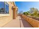 Spacious back patio with a view and access to the backyard at 4221 E Carriage Way, Gilbert, AZ 85297