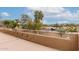 Elevated view of backyard oasis with pool, outdoor kitchen, and string lights at 4221 E Carriage Way, Gilbert, AZ 85297