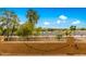 Elevated view of backyard with string lights and distant mountain views at 4221 E Carriage Way, Gilbert, AZ 85297