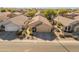 Single-story home with a two-car garage and desert landscaping at 4233 E Creosote Dr, Cave Creek, AZ 85331