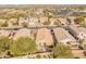 Wide aerial view of the home and surrounding neighborhood at 4233 E Creosote Dr, Cave Creek, AZ 85331