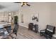 Living room with wood-look floors and built-in shelving at 4233 E Creosote Dr, Cave Creek, AZ 85331