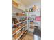 Well-organized pantry with ample shelving for storage at 4233 E Creosote Dr, Cave Creek, AZ 85331