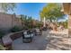 Spacious backyard patio with seating and desert landscaping at 4233 E Creosote Dr, Cave Creek, AZ 85331