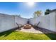 Relaxing backyard patio with fire pit and seating area at 4333 W Shaw Butte Dr, Glendale, AZ 85304